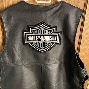 Leather vest.